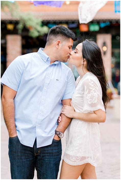 Couple Kissing While Taking Photos For Their Downtown San Antonio