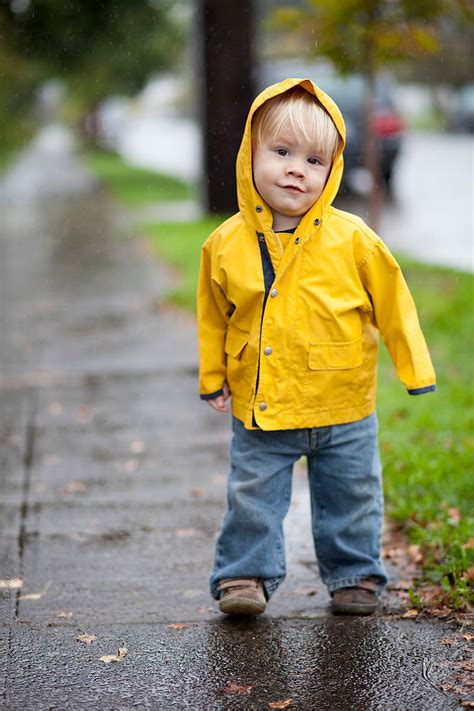 19 Month Old Boy In Yellow Rain Jacket On A Rainy Day In Portland