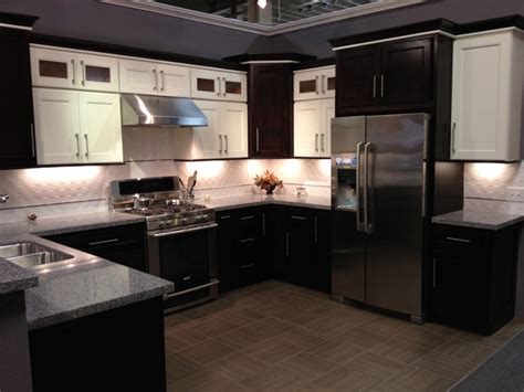 This is balanced by the light beige marble flooring that blends well with the wooden kitchen island under two small chandeliers. Model# 4D Chocolate Maple recessed Panel Kitchen Cabinets - Contemporary - Kitchen - San ...
