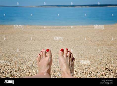 Woman Sunbathing At Beach Hi Res Stock Photography And Images Alamy