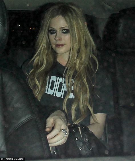 Going Goth Avril Lavigne Sports Heavy Panda Eyes And Lace Up Leather Trousers For A Date With