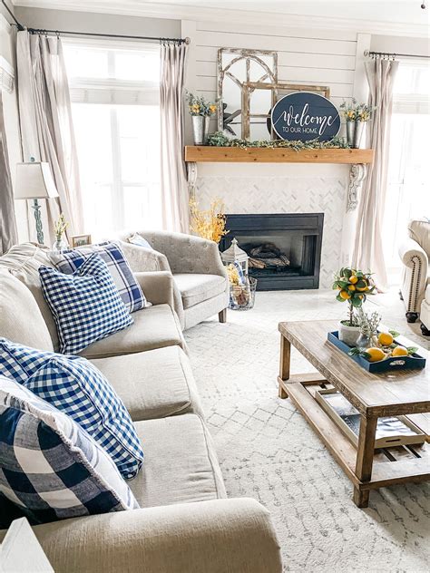 If a moodier room appeals to you, a navy. Navy decor in the living room for Spring with yellow ...