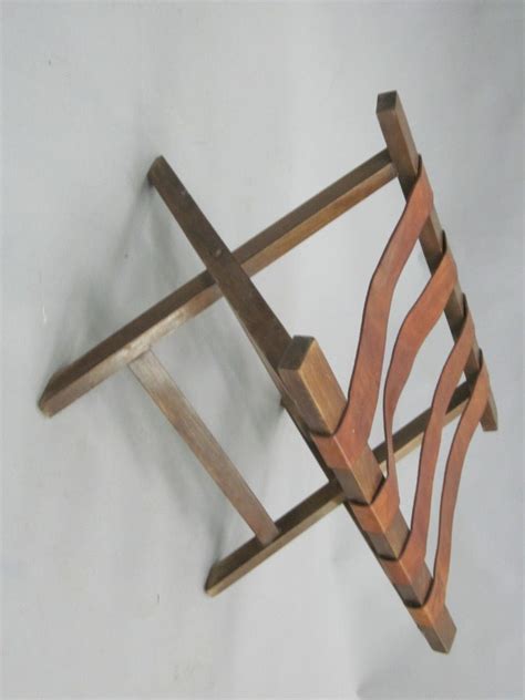 Maybe you would like to learn more about one of these? French 40's Leather Strap Bench / Luggage Rack at 1stdibs