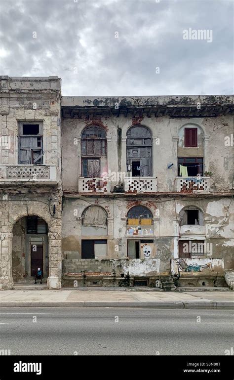 Old Run Down Building In Havana In Front Of Malecón Seaside Avenue