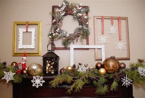 A large, windowless wall can be the perfect canvas for creative decor ideas. Empty frames holiday mantel decor | Living Rich on Less