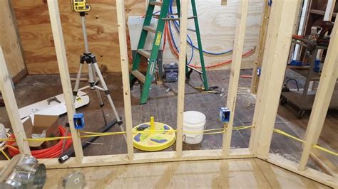 Here a crew member pulls the layout from the end of the wall and marks every stud, including those that fall in the openings for the doors and windows. Pin by Rickie S on wall internals/stud layout | Home ...