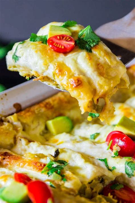 Preheat oven to 350 degrees f. Cheesy, gooey, melt in your mouth white sauce enchiladas ...