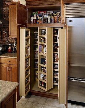 On slabs 39″ high wall cabinets could be used with a single filler reaching the ceiling if that custom hieght is available. 36 inch Pantry Unit with swing outs | Organization Ideas ...