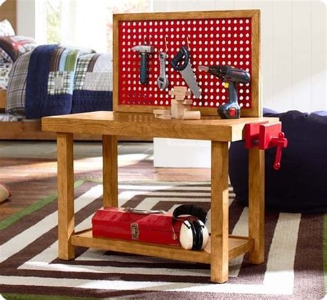 A smooth work area, tool storage area, and shelf offer little ones multiple areas to organize their tools. Kids Tool Bench - KnockOffDecor.com