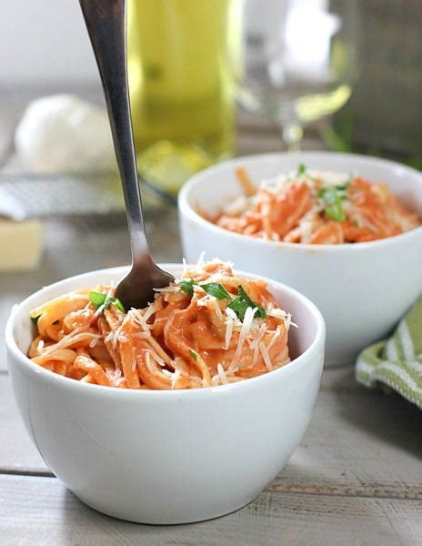 Pasta with tomato and roasted garlic cream sauce. Pasta with Tomato Cream Sauce | Laughing Spatula