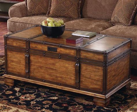 Also makes a handsome bench, this beauty is built of solid wood with large medallion designs and stands on. 25 Coffee Table on Wheels for Small Spaces | Wooden trunk ...