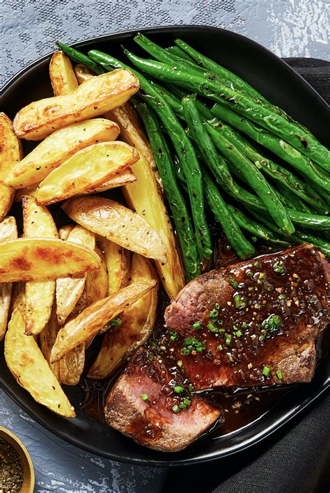 Before roasting, season them with bay leaves and fresh sage for an earthy side dish, or toss them with rosemary and minced garlic for something more classic. Beef Tenderloin Au Poivre with Roasted Potatoes & Green Beans | Recipe in 2020 (With images ...