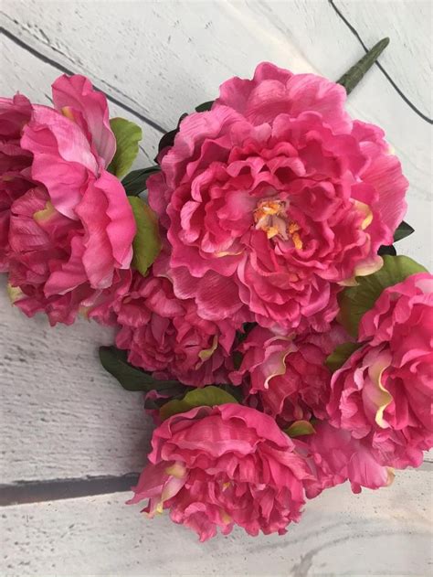 You can buy peony support cages that are specifically made for flowers like peonies, like this one with stackable rings. Hot Pink Peony Bush Peony Bush Artificial Peony Peony for ...