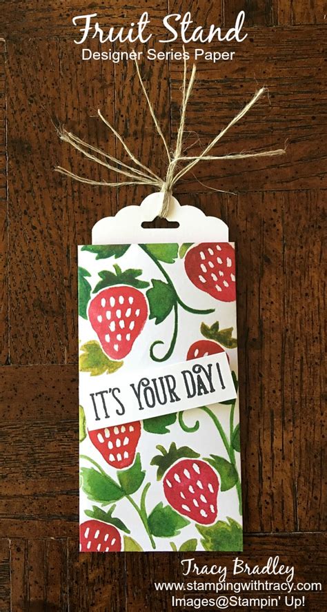 Then, use your index and pinky fingers to grip the long sides of the card as tight as you can. Gift Card Sleeve Using Fruit Stand DSP | Stamping With Tracy