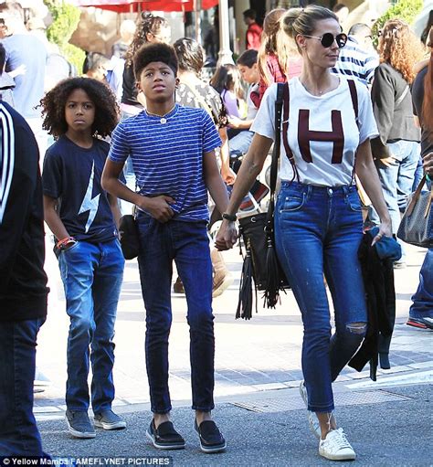 Model, tv personality and entrepreneur. Heidi Klum braves Black Friday bustle as she takes sons ...