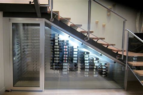 Get inspired with photos of custom build outs. Dallas Modern Wine Cellar Project Under a Staircase