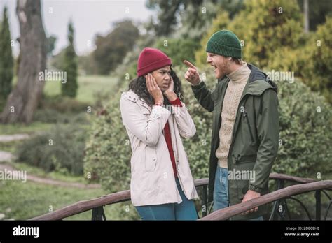 Man Yelling At His Partner While Walking Together Stock Photo Alamy