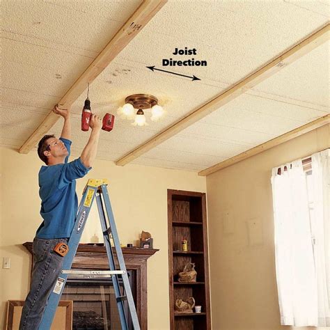 Since you're working with electricity, cut the power to the room. Ceiling Panels: How to Install a Beam and Panel Ceiling ...