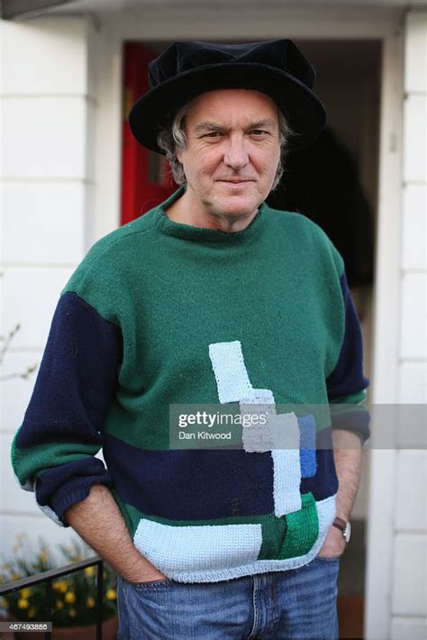 Top Gear Presenter James May Poses For A Photograph Outside His Home