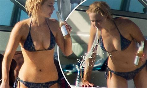 Jennifer Lawrence Flaunts Stunning Bikini Body As She Swigs Beer In The Bahamas Daily Mail Online