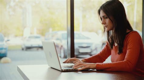 Woman Typing On Laptop Smiling At Cafe Timelapse Stock Video Footage 0010 Sbv 304477689