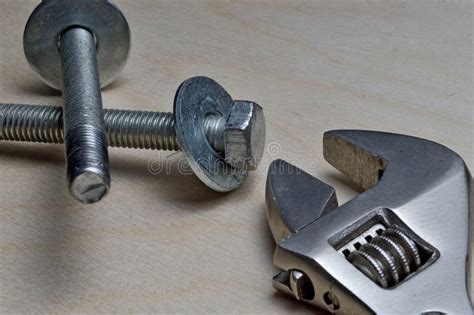 Adjustable Wrench With Metal Nut And Bolts Close Up Stock Photo
