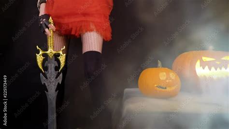 Girl Celebrate Halloween With Burning Pumpkins Have Fun Rejoices Pretty Sexual Devil Woman