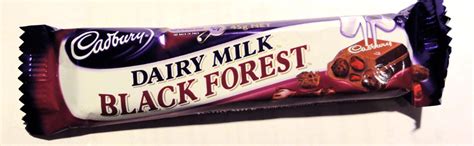 Line a 20cm square pan with baking paper, allow a 5cm excess above the pan. Cadbury Dairy Milk Black Forest