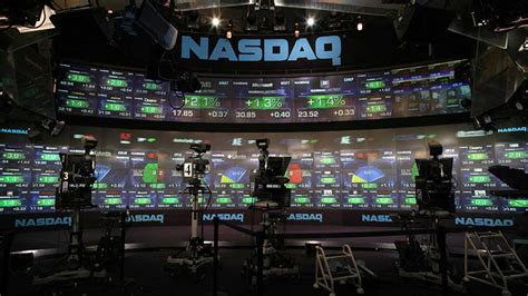 Traders flag nasdaq 100 stocks to watch with broader index above 10,000. Business