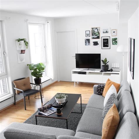 Pairing white accents and wood tones with moody hues, including black, can make your. Home - JulesJetsets | Minimalist living room decor ...