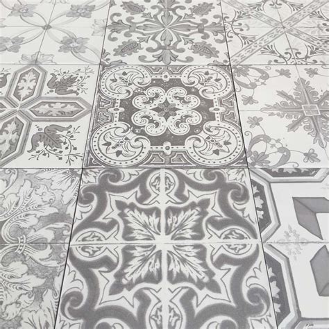 From kitchens to bathrooms, conservatories to hallways, our quality tiles are made from durable materials and are easily maintained. Nikea Sephia patterned tile set is a grey colour floor ...