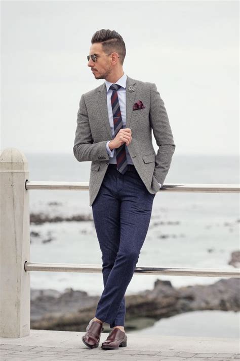 Cargo pants have been used as an outfit by british military, and taking the influence from them, the cargo pants have made their way to mainstream fashion. Gray blazer + striped tie + flower lapel + maroon pocket ...