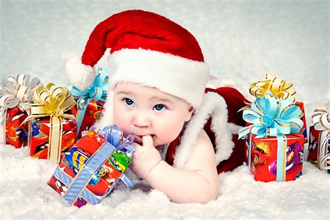 Baby In Santa Hat Surrounded By T Boxes Hd Wallpaper Wallpaper Flare
