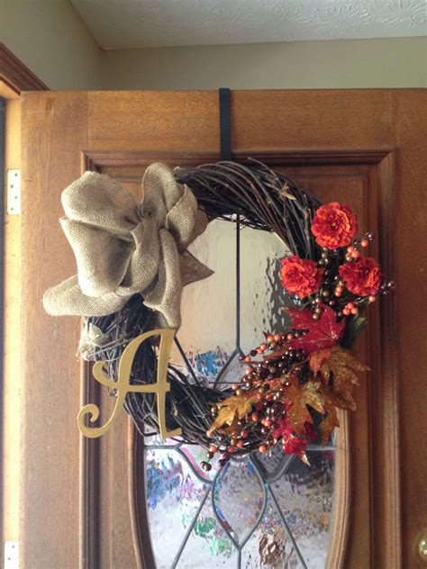 Fall wreath with burlap bow and letter from hobby lobby. | Fall wreath