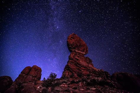 Arches National Park At Night Balanced By Michael Riffle