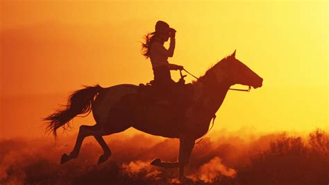 Download Cowgirl On Horse Wallpaper