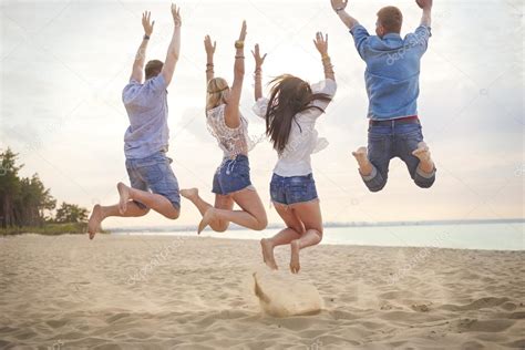 Group Of Friends Jumping In The Air Stock Photo By ©gpointstudio 116921012