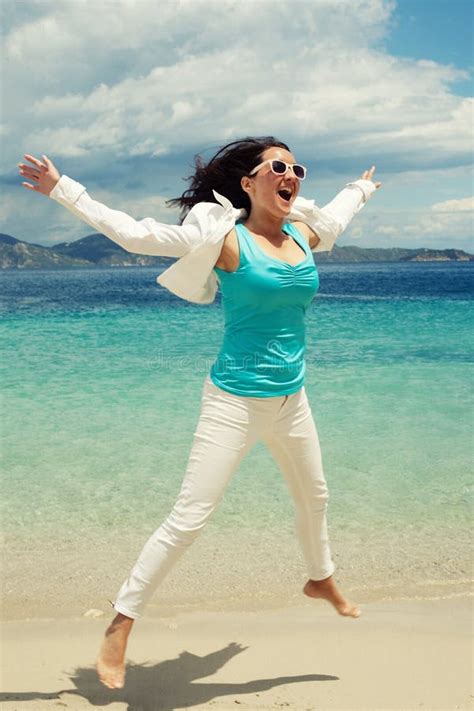 Happy Girl Jumping On The Beach Stock Image Image Of Holiday Jump