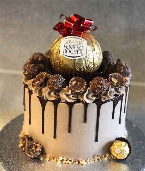 It's a perfect birthday treat or something to bake when you're craving those chocolate flavored hazelnuts. CakeMenu on Instagram: "Giant ferrero rocher drip cake ...