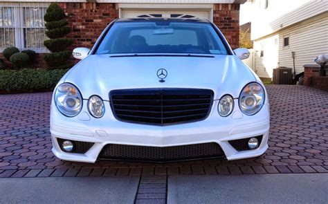 The rear design conveys more elegance and lightness with its new, flatter and now. Mercedes-Benz E320 W211 E63 AMG LOOK | BENZTUNING