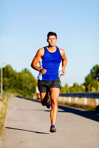 Young Man Sprinting Stock Photo Download Image Now Marathon