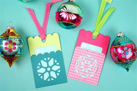 Chasity (@chiciscre8ive) has designed some wonderful gift card holders and has a free template for you to download, plus free svg files! Snowflake Gift Card Holder Tags + Christmas SVG File ...