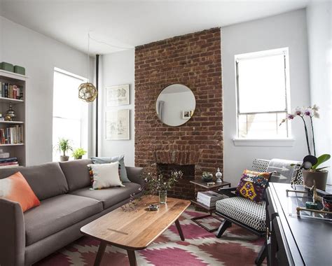 My Husband Loves Our Ugly Brick Fireplace | laurel home Arranging living room furniture in a rectangular room.
