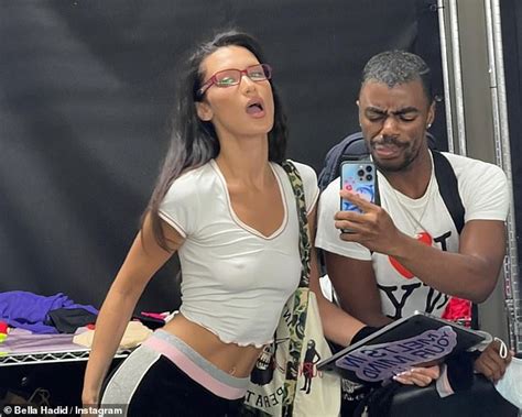 Braless Bella Hadid Flaunts Her Washboard Abs In A Clinging White Crop Top As She Shares A Slew