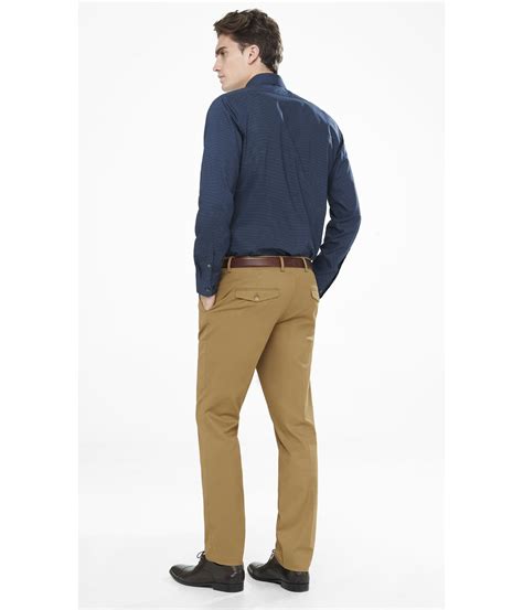 Going to work can demand some uncomfortable outfits that end up becoming a chore very quickly. Express Extra Slim Innovator Cotton Brown Dress Pant in ...