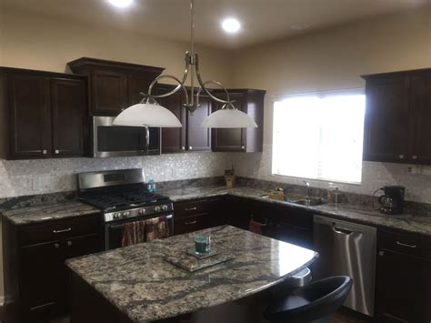Dark granite countertops photos of cabinet combinations graniterra. Modern kitchen: Dark cabinets, dark quartz countertops ...