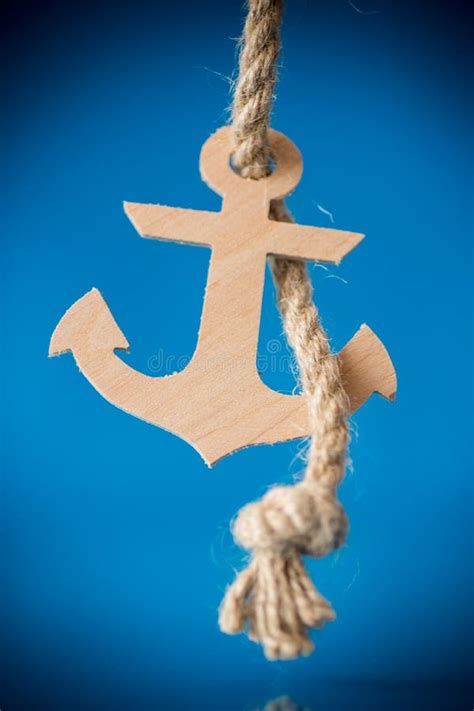 Wooden Decorative Anchor On A Blue Background Stock Image Image Of