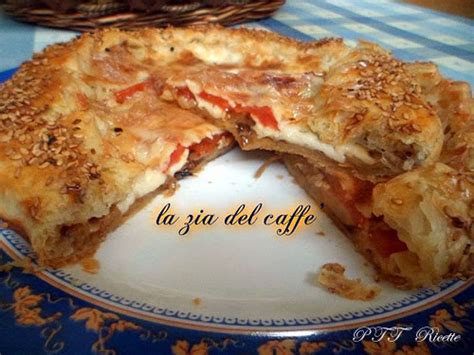 Cuocere in forno preriscaldato a 200 gradi per 40 mintui. Pasta sfoglia con melanzane, pomodoro e mozzarella - PTT ...