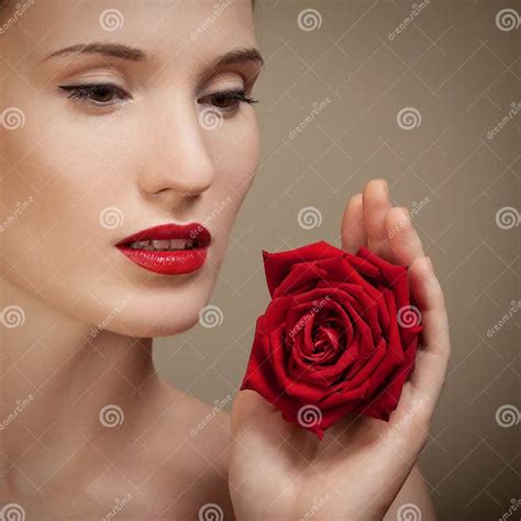 Beautiful Woman Holding Red Rose In Hand Stock Photo Image Of Pink