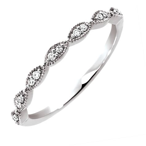Wedding band creation crafted with a satin finish. Wedding Band with Diamonds in 10kt White Gold